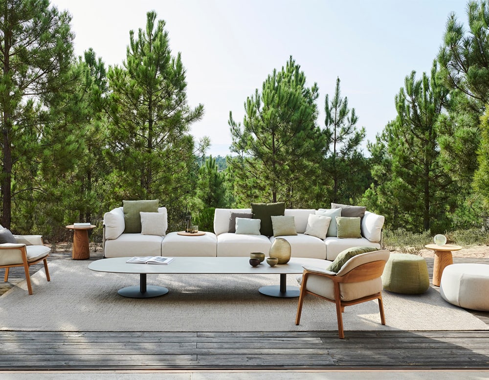sofa made with steel on its base and white fabric on the outside