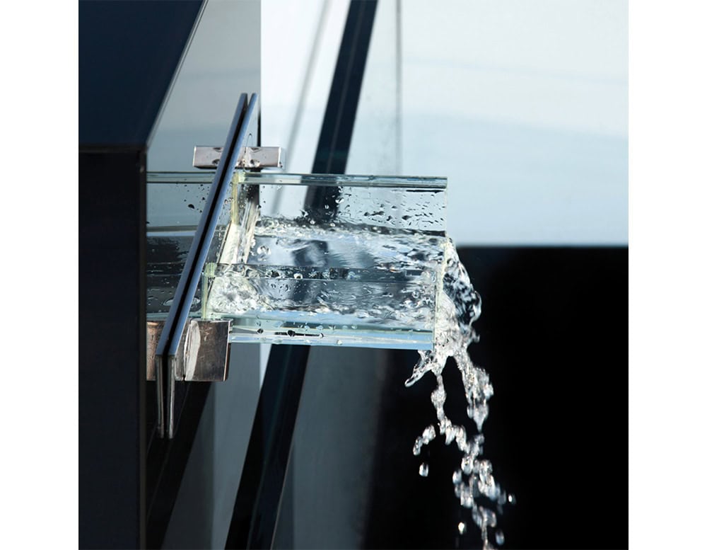 Simplicity Bath featuring a transparent modern faucet with a cascading water flow design