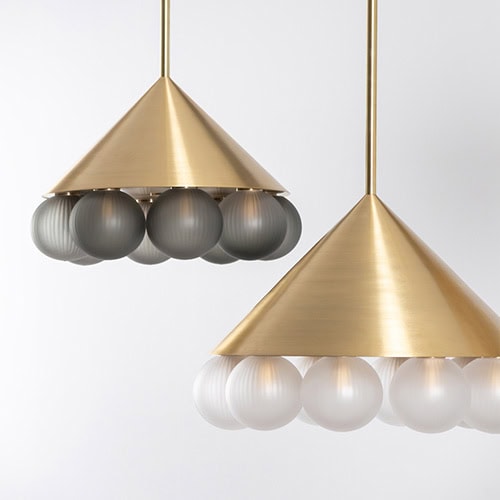 two Rings of blown glass spheres in shades of black, white and gold