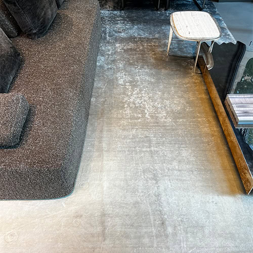 A custom Bambu Silk Rug showcasing a delicate gradient in neutral tones seamlessly blending into a contemporary living space