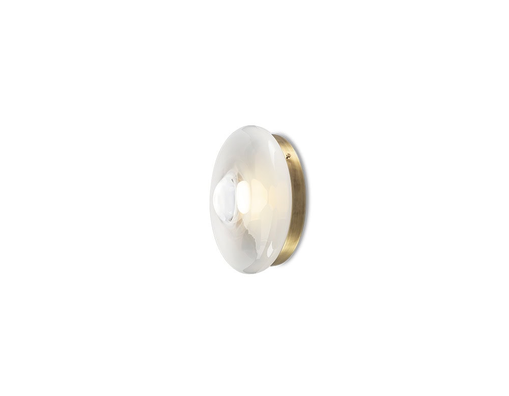 Bom Orbital Wall Light – A striking wall light with a futuristic design and brushed metal finish, ideal for illuminating a modern dining or living area.