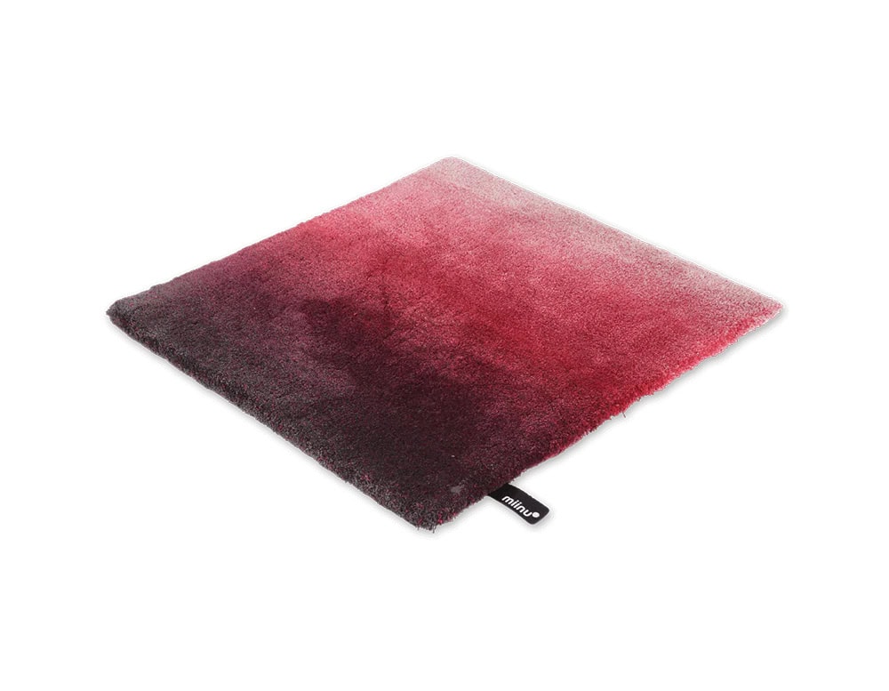 DeViant Rug blends deep merlot with bright rose, creating a rich gradient that adds warmth and vibrancy to contemporary interiors.