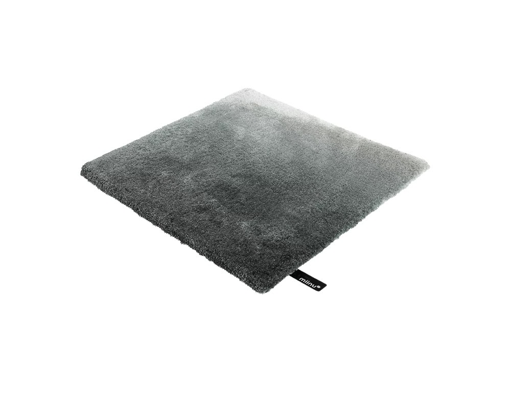 DeViant Rug is crafted in a smoky gradient ranging from deep charcoal to soft silver gray. Its plush texture and neutral tones create a subtle yet elegant foundation ideal for minimalist and contemporary interiors.