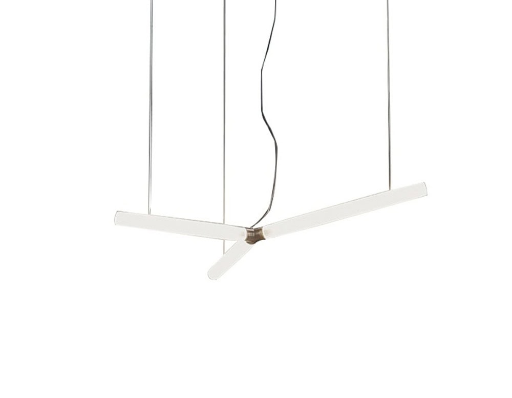 Therna Ceiling Light floats above with sharp linear precision. Suspended by slim cables, its luminous arms extend outward in perfect balance, highlighting its sculptural form against a crisp, white backdrop.