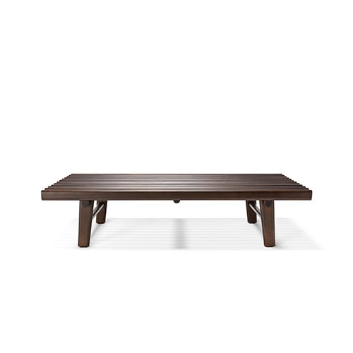 The Ext Elba Coffee Table Outdoor showcases a sleek slatted wood surface and a sturdy leg structure, bringing timeless simplicity and natural warmth to outdoor lounging spaces.