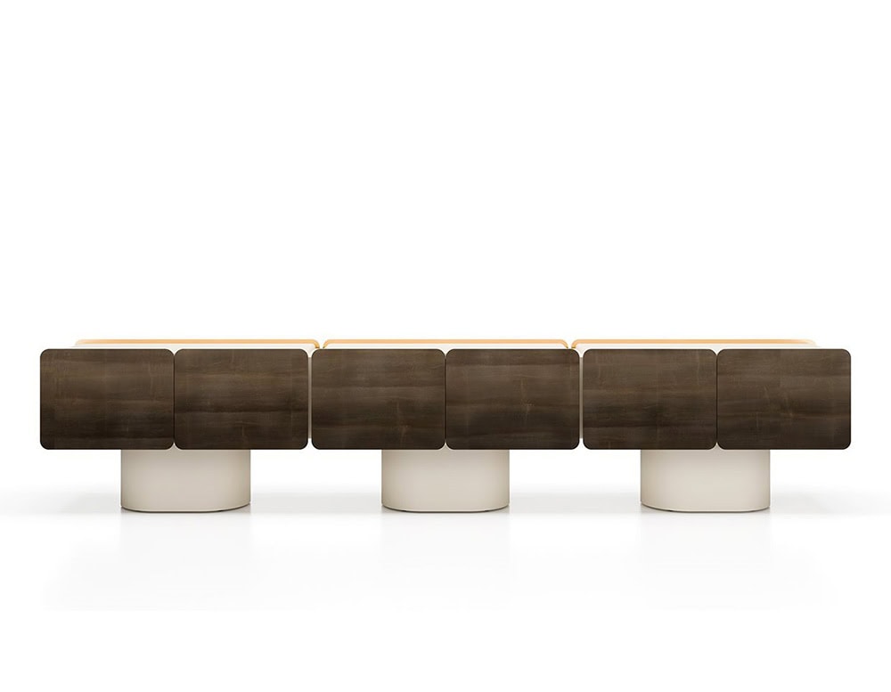 The GR Admira Cabinet with a walnut wood finish and soft beige cylindrical bases, combining warm tones with clean, geometric forms.