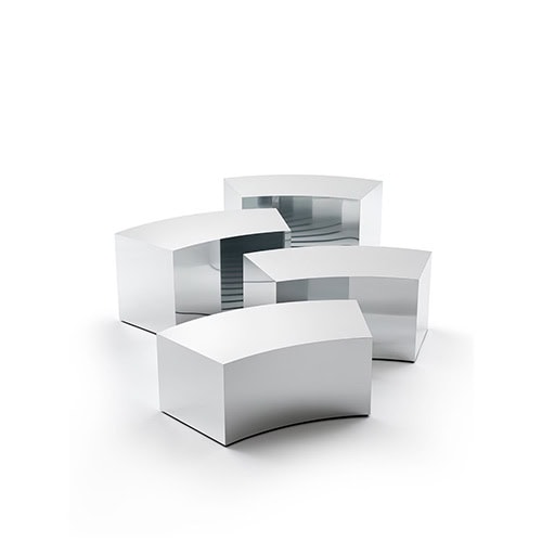 The GR Arch Coffee Table features clean, geometric curves with a polished mirror-like finish. The reflective surface creates a sleek and luminous effect while keeping the palette cool and neutral.