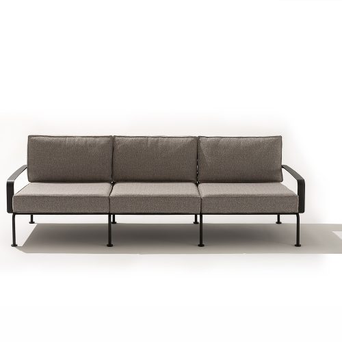 A minimalist seating design defined by its airy metal frame and tailored cushions. The elevated structure and subtle detailing offer a refined, contemporary look while maintaining comfort and versatility.