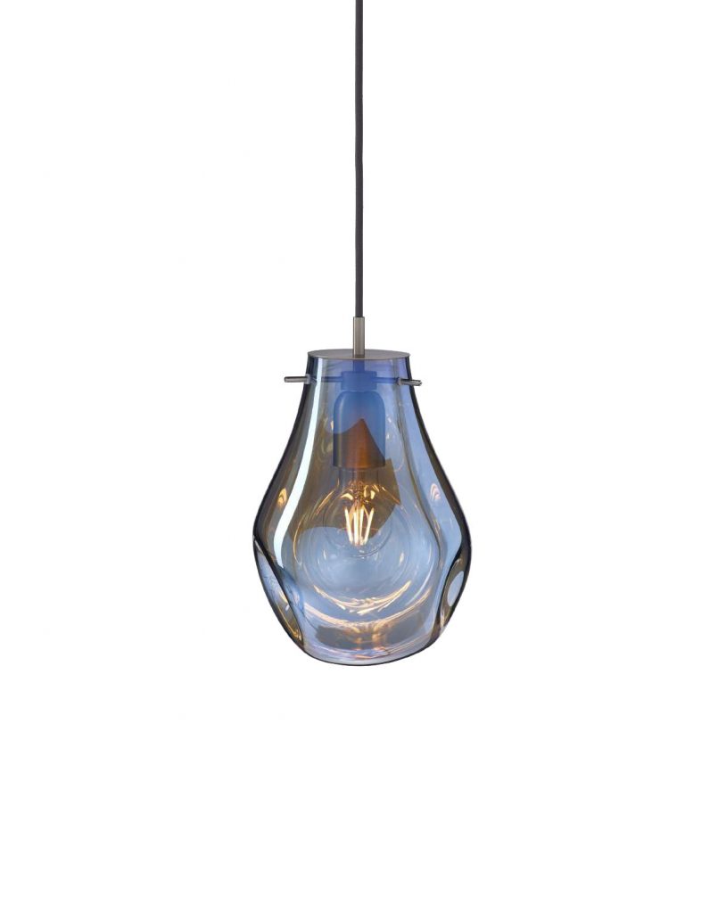 A hand blown blue glass pendant light with a rounded teardrop shape and smooth contours. Its transparent finish reveals the warm bulb inside, creating soft reflections and an elegant balance of color and light.